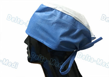 Cappucci medici eliminabili con la corona bianca, cappelli eliminabili respirabili di Doctor S della sala operatoria